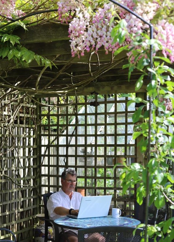 copywriter working in the garden